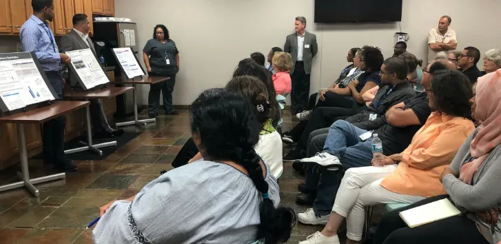 Employee Engaged in Meeting