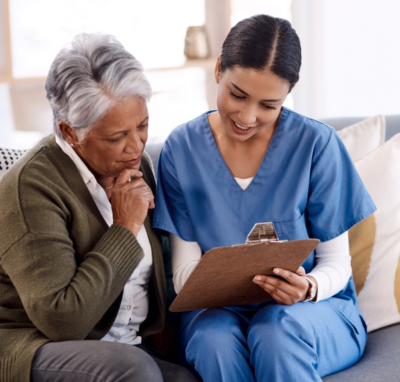 Elderly Woman With Nurse